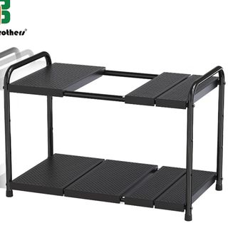 An expandable under-the-sink rack in black