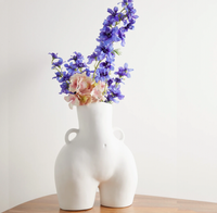 Anissa Kermiche Love Handles Vase at MATCHESFASHION Save 25% was £340 now £255Made in Portugal from ceramic that's fired with a sophisticated matte finish, a pair of handles and a belly button indent. Fill it with freshly cut flowers or place it as an artistic focal point to any room.