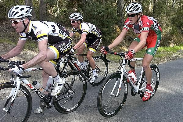 Local boy Ben Grenda (Praties) follows Budget Forklift's Peter Herzig and Blair Windsor on the climb out of Lilydale.