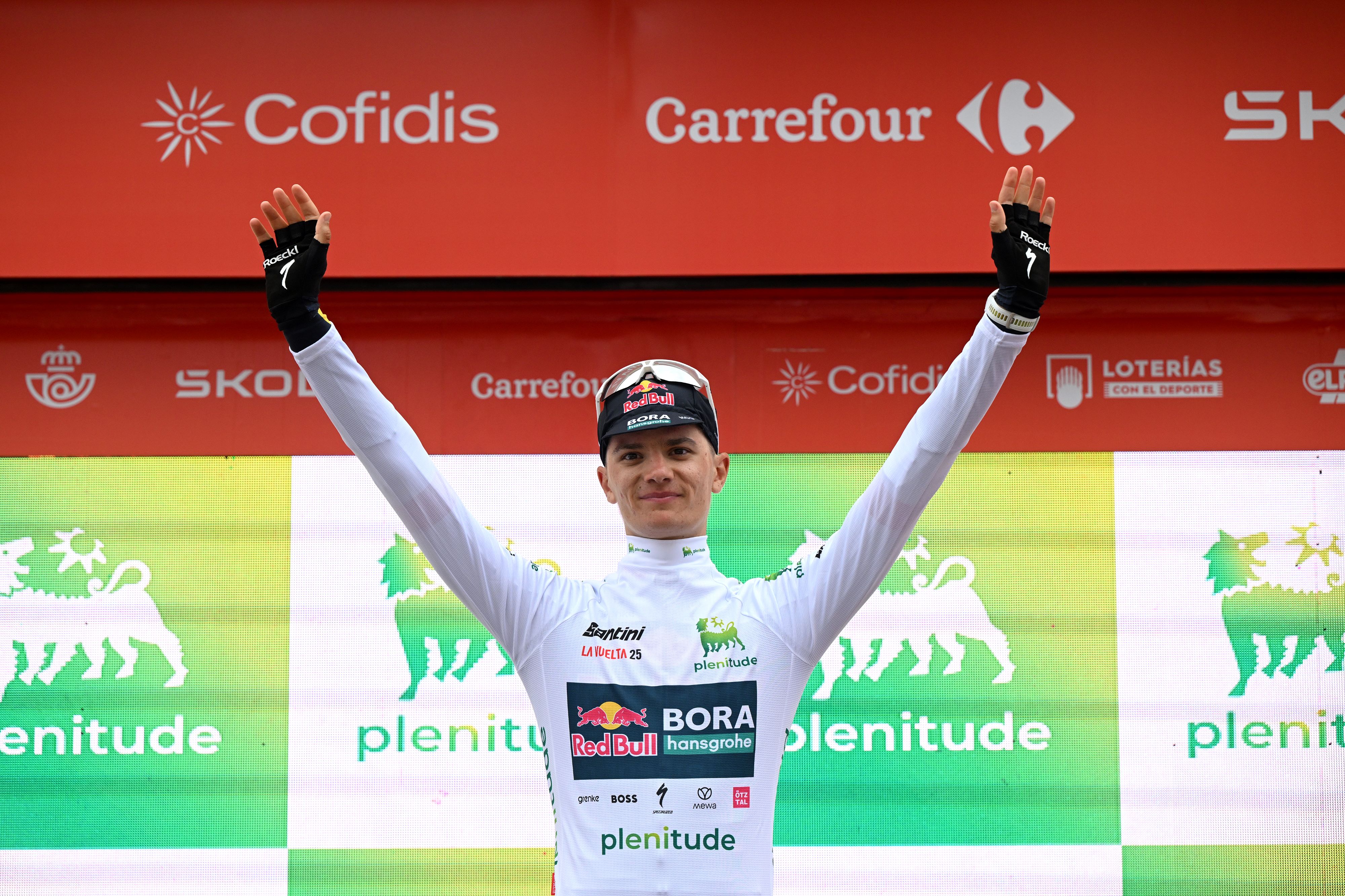 Giulio Pellizzari has white jersey on stage 12 of La Vuelta 2025.