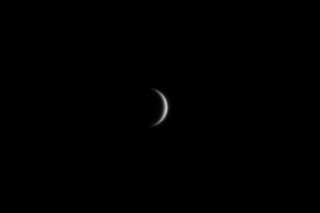 France. Seine et Marne. Planet Venus. View of the very thin crescent of the planet like in an amateur telescope. The image was taken on may 16th in the evening.