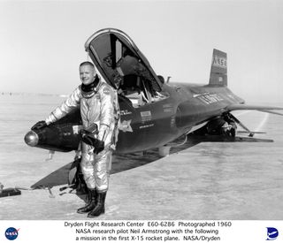 Dryden pilot Neil Armstrong is seen here next to the X-15 ship #1 (56-6670) after a research flight. 