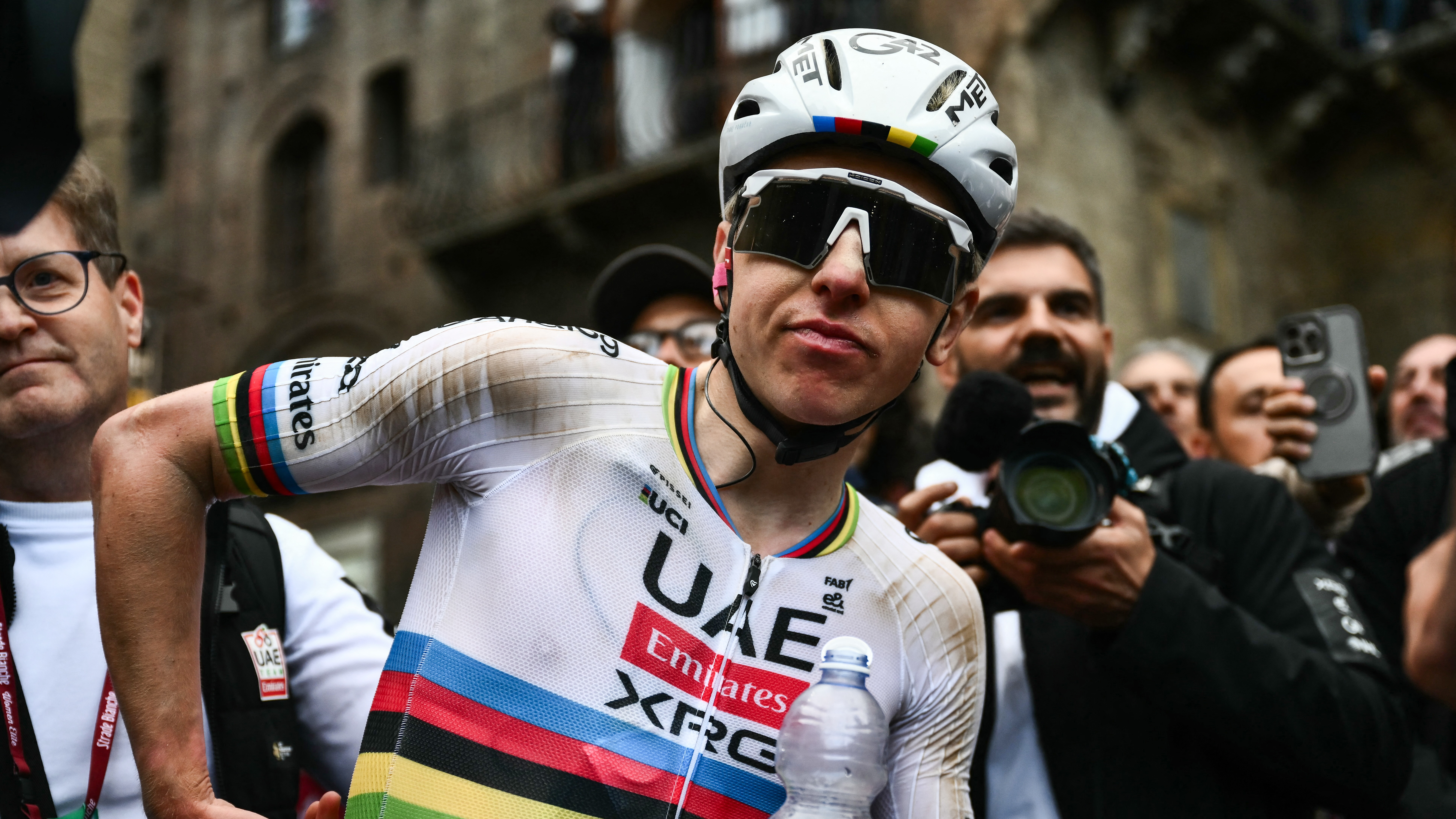 UAE Team Emirates's Slovenian Tadej Pogacar celebrates after winning the 20th one-day classic 'Strade Bianche' (White Roads) men's cycling race between Siena and Siena in Tuscany on March 7, 2026. 