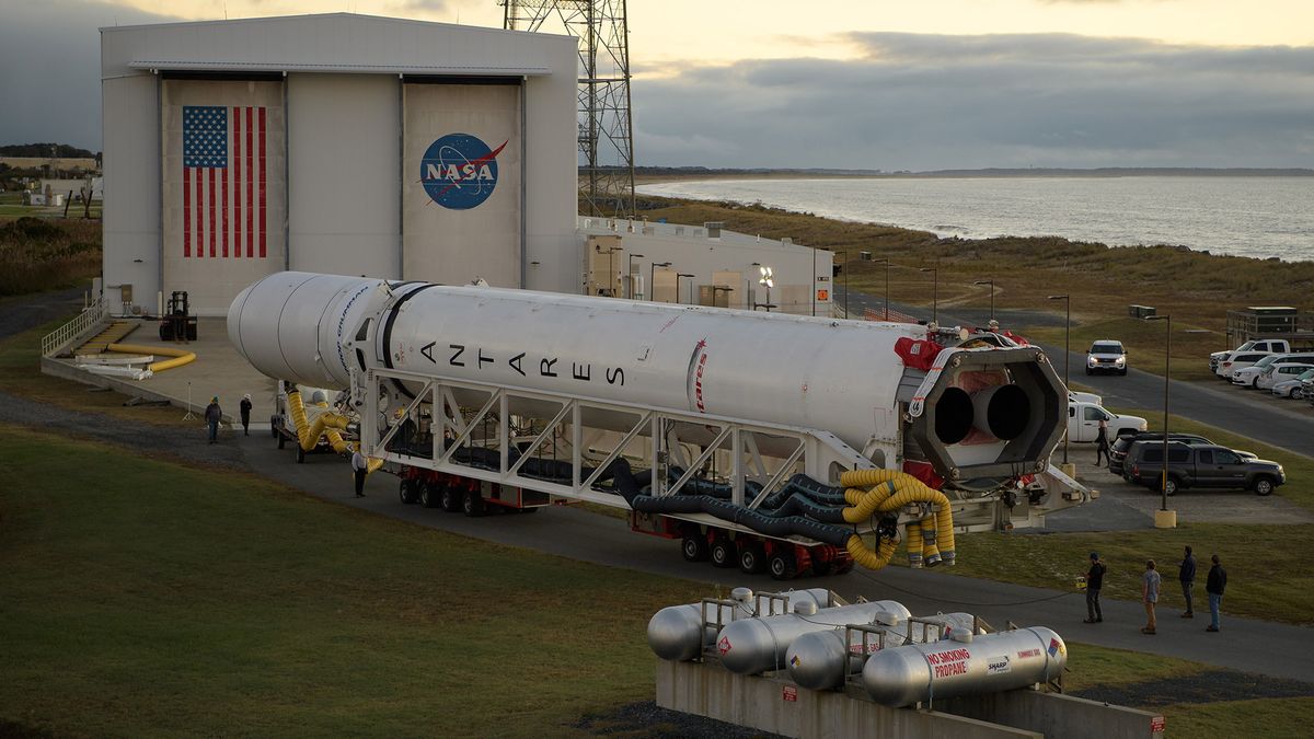 A Northrop Grumman Antares rocket is seen as it is rolled out of the Horizontal Integration Facility to launch Pad-0A, Tuesday, Oct. 29, 2019, at NASA's Wallops Flight Facility in Virginia.