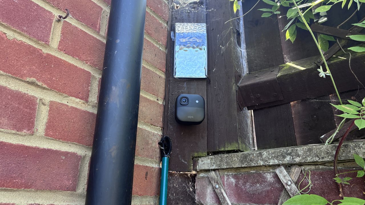 Blink Outdoor 2K+ security camera mounted on wall