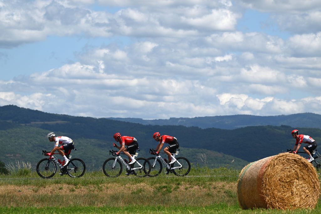 CHASTREIXSANCY FRANCE JUNE 07 LR Jasper Stuyven of Belgium and Team Trek Segafredo Anthony Delaplace of France and Thibault Guernalec of France and Team Arka Samsic compete during the 74th Criterium du Dauphine 2022 Stage 3 a 169km stage from SaintPaulien to ChastreixSancy 1391m WorldTour Dauphin on June 07 2022 in ChastreixSancy France Photo by Dario BelingheriGetty Images