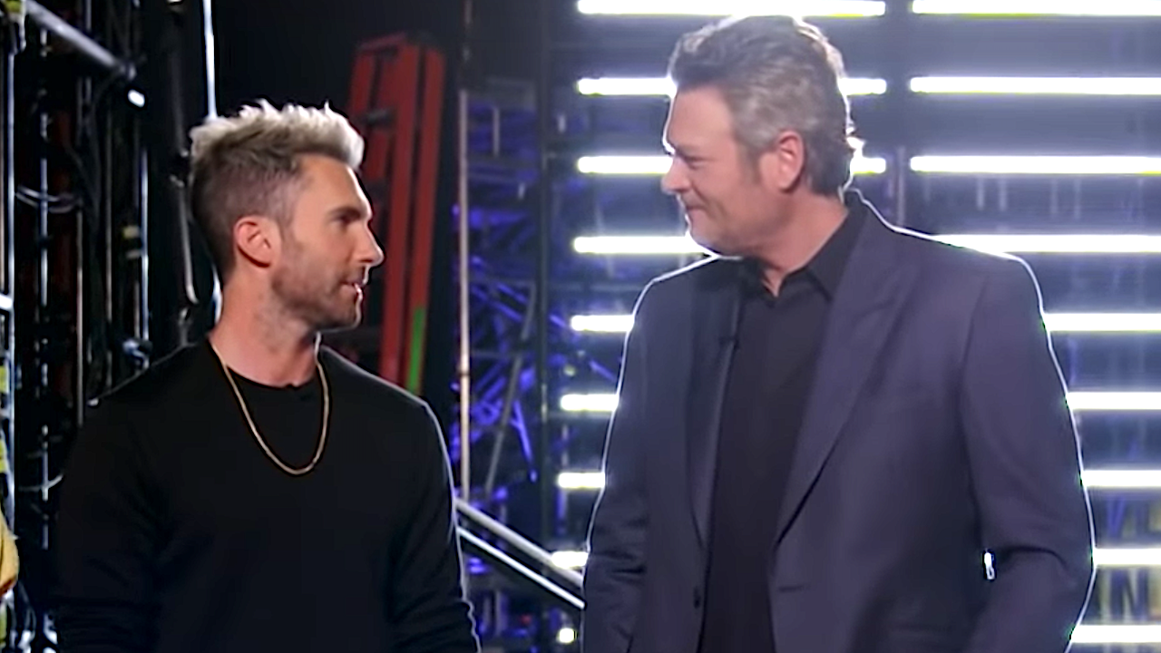 Adam Levine and Blake Shelton look at each other on The Voice.