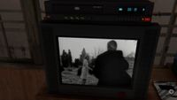 Night of the Living Dead's opening scene plays on an old television with a VHS on top