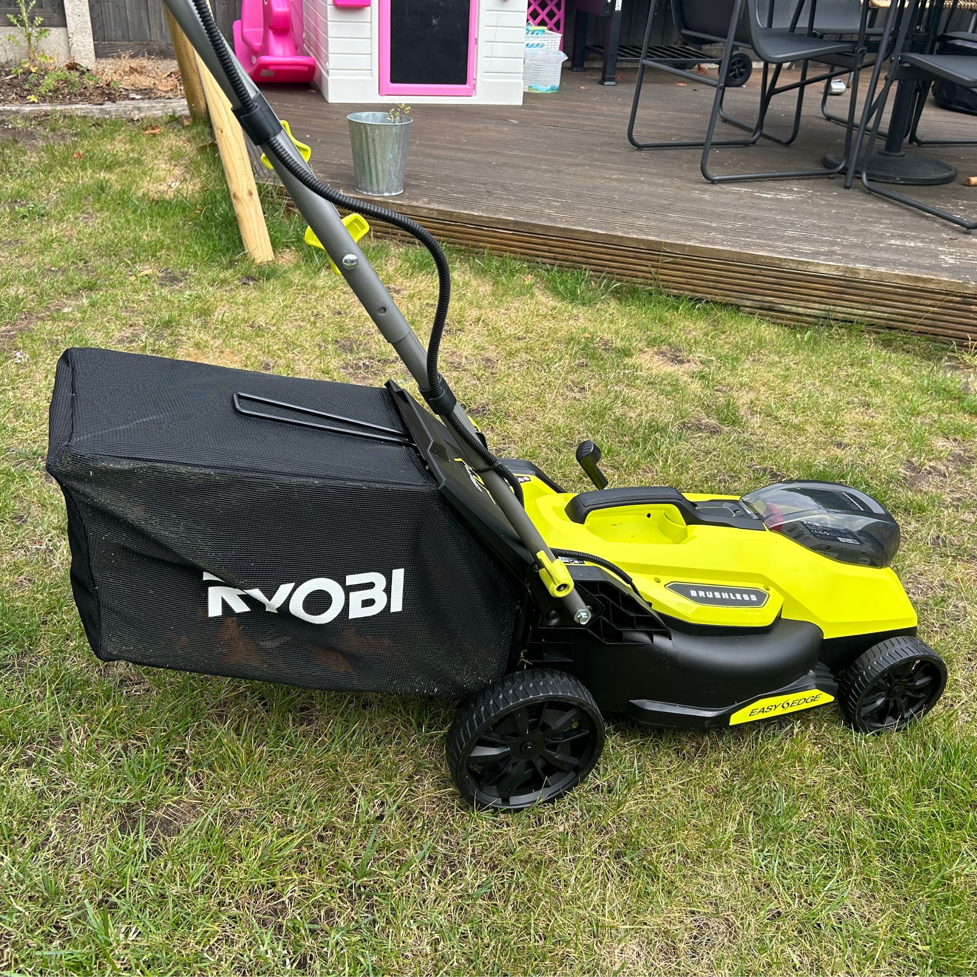 Lawnmower with grass box attached, fully assembled