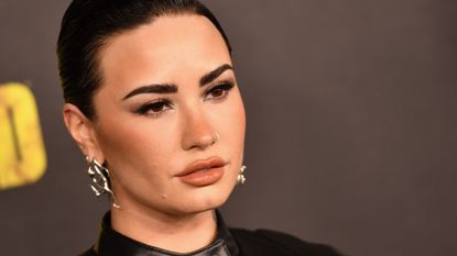 US singer/actress Demi Lovato arrives for The Walking Dead series finale event at the Orpheum theatre in Los Angeles, November 20, 2022