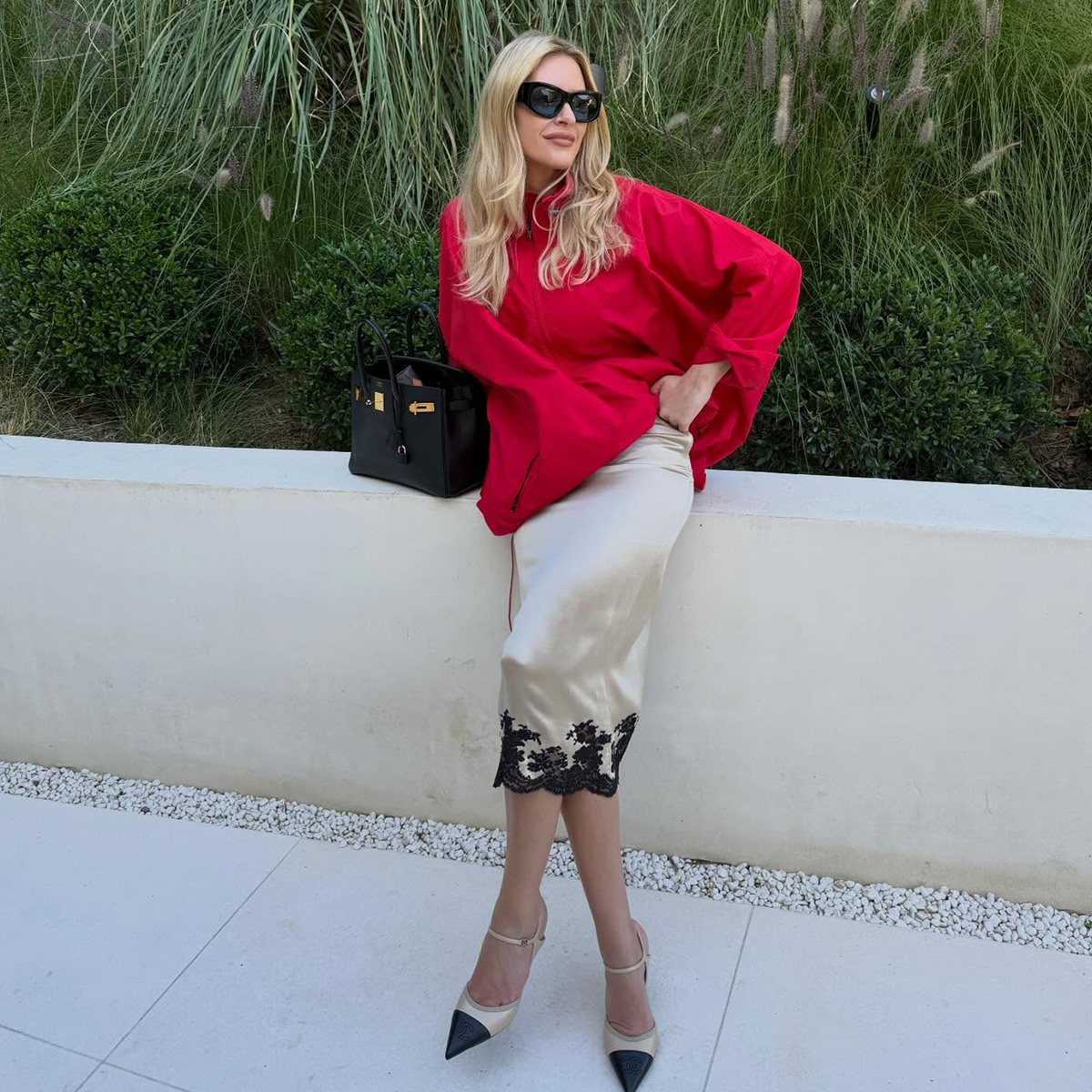 a photo of Morgan Stewart wearing cap-toe Chanel pumps featuring the biggest spring 2026 shoe trends