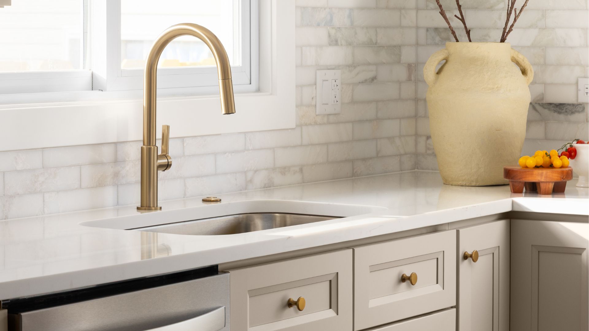 picture of marble kitchen counter with gold taps in modern kitchen