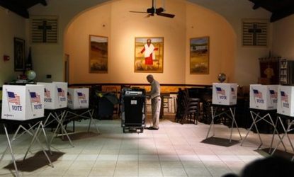 A volunteer sets up a polling station in preparation for Tuesday's GOP primary in Florida: The Sunshine State winner will gain big-time momentum heading into Super Tuesday on March 6.