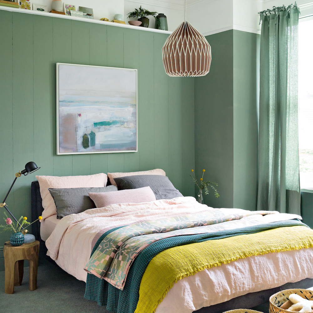 bedroom with bed with wooden bedside table