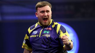 Luke Littler in action during his quarter-final match against Gerwyn Price during day five of the Boyle Sports World Grand Prix at Mattioli Arena on October 10, 2025 in Leicester, England. 