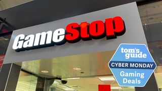 A photo of a GameStop store front with a Tom's Guide Cyber Monday badge placed in the bottom right corner