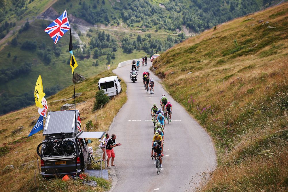 A British flag greets Chris Froome during stage 20