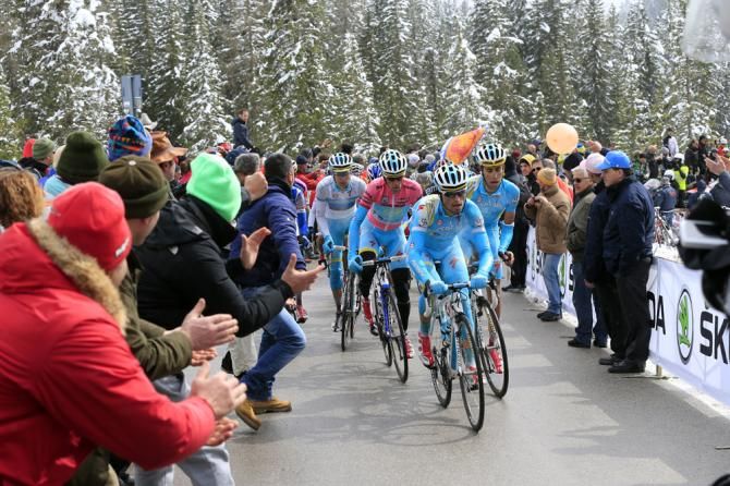 Astana lead the peloton over the final climb of the day