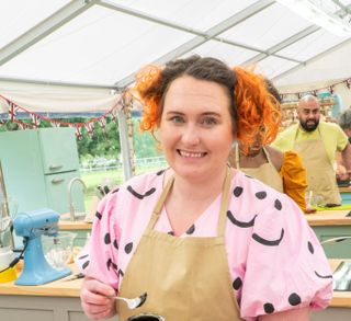 Lizzie, a contestant from The Great British Bake Off 2021