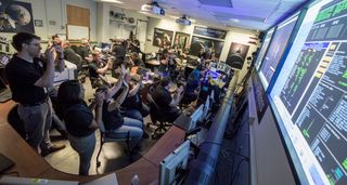 New Horizons Flight Controllers Celebrate