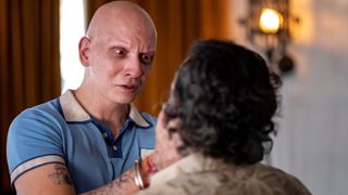 Anthony Carrigan (as NoHo Hank) clutches Michael Irby (as Cristobal Sifuentes) in Barry