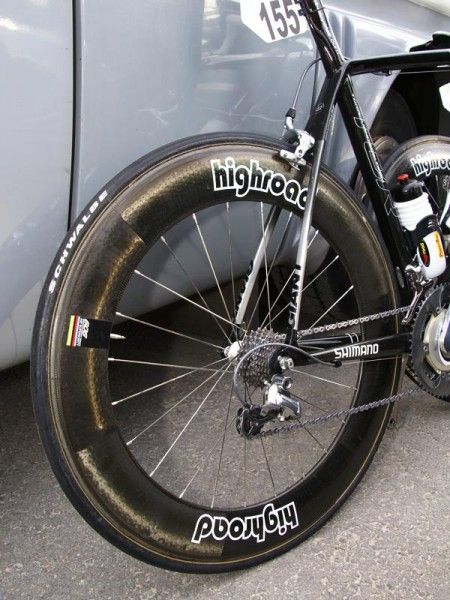 It's common practice in the pro peloton to pair a deeper rear wheel with a shallower front for better handling.