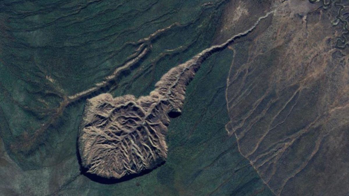 Satellite image of the tadpole-shaped Batagay crater in the northern Sakha Republic, Russia.