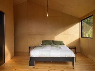New Zealand converted beach cabin bedroom one