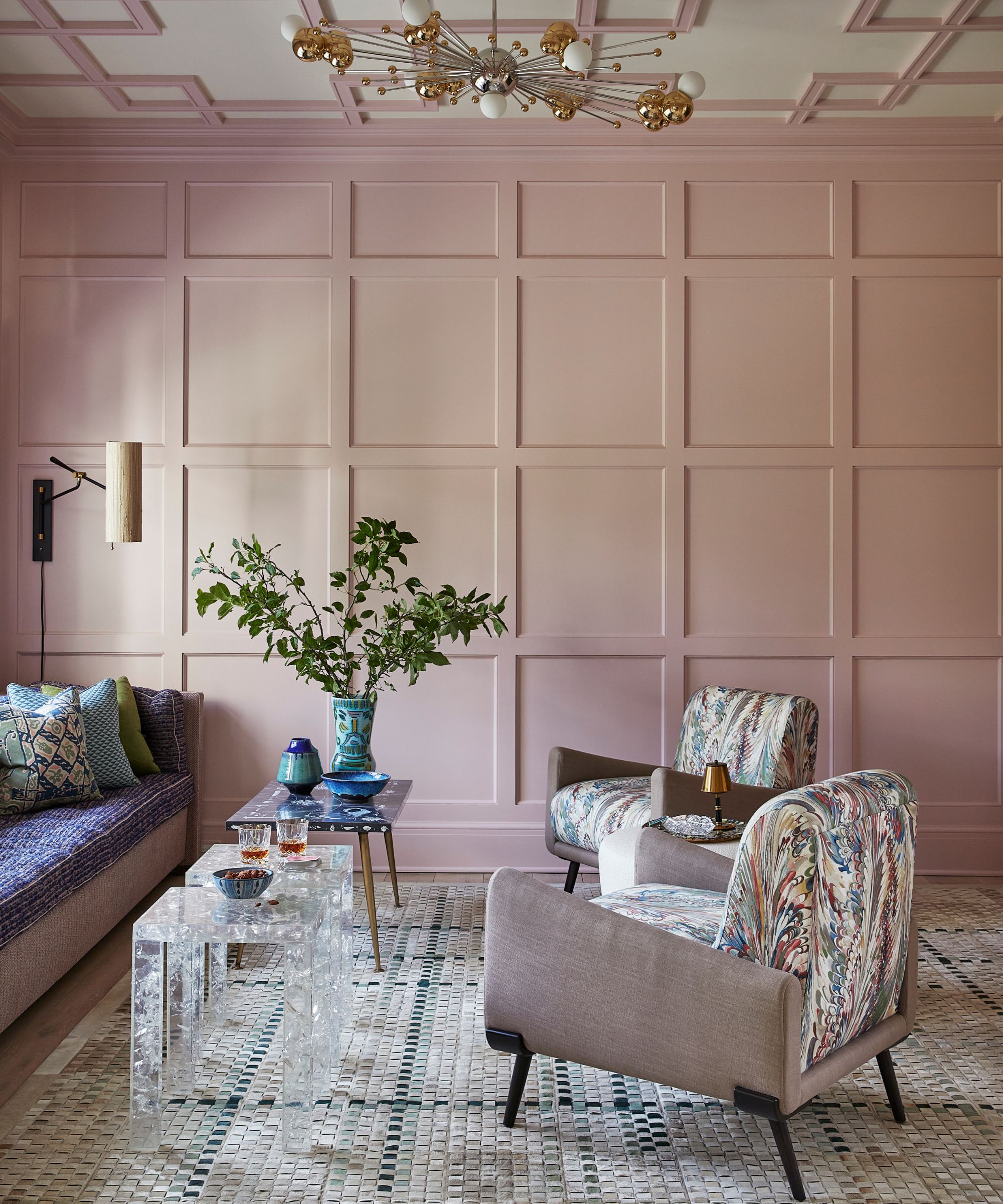 Phillip Thomas Interiors bar lounge area with pink wall panelling and a metallic pendant lamp