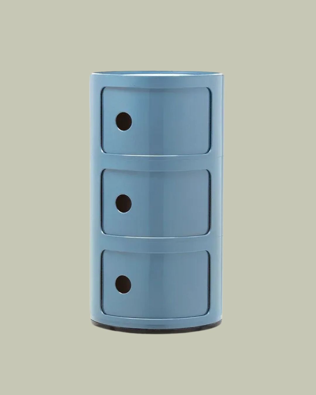 Componibili cabinet against green background.