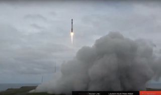 A Rocket Lab Electron booster lifts off from New Zealand on March 28, 2019, carrying the R3D2 satellite to orbit for the U.S. Defense Advanced Research Projects Agency.