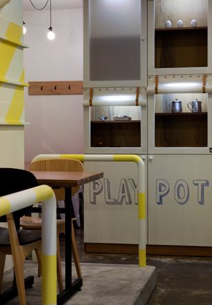 Table and chairs in Play Pot restaurant