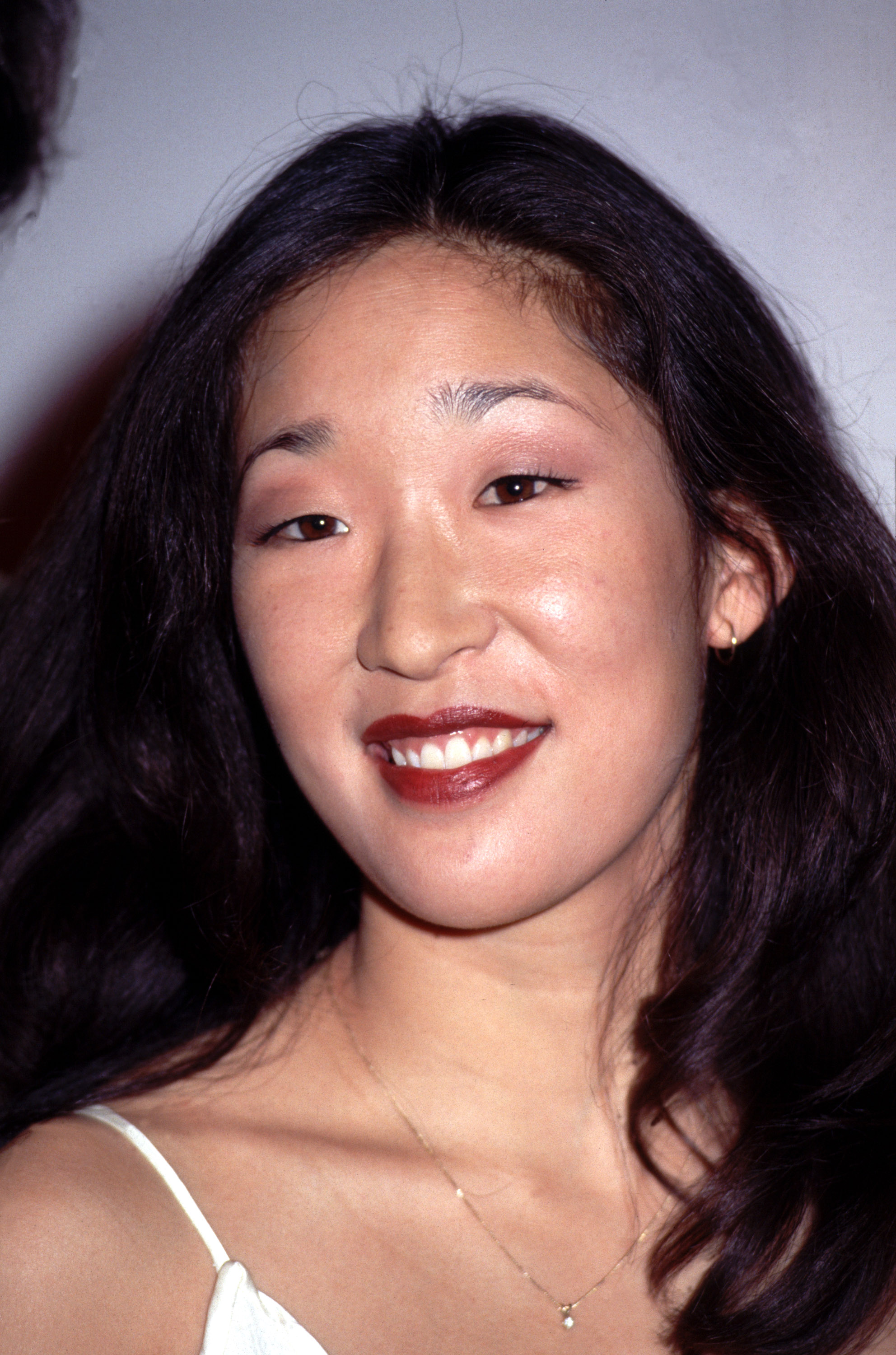Sandra Oh Poses For Photographers At The Montreal World Film Festival In This Undated Photograph