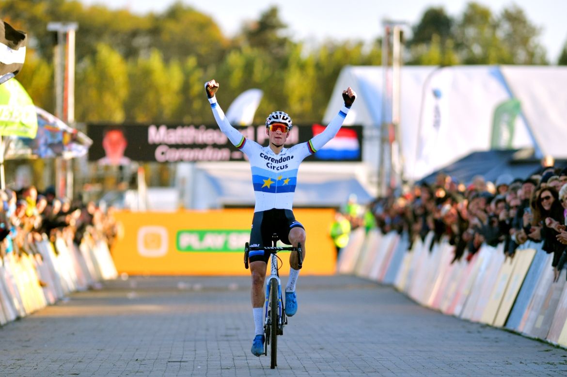 Mathieu van der Poel raises his arms aloft again