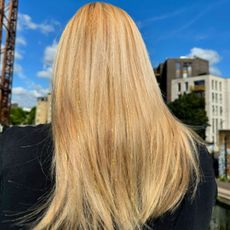 Blonde woman with hair tinsel 