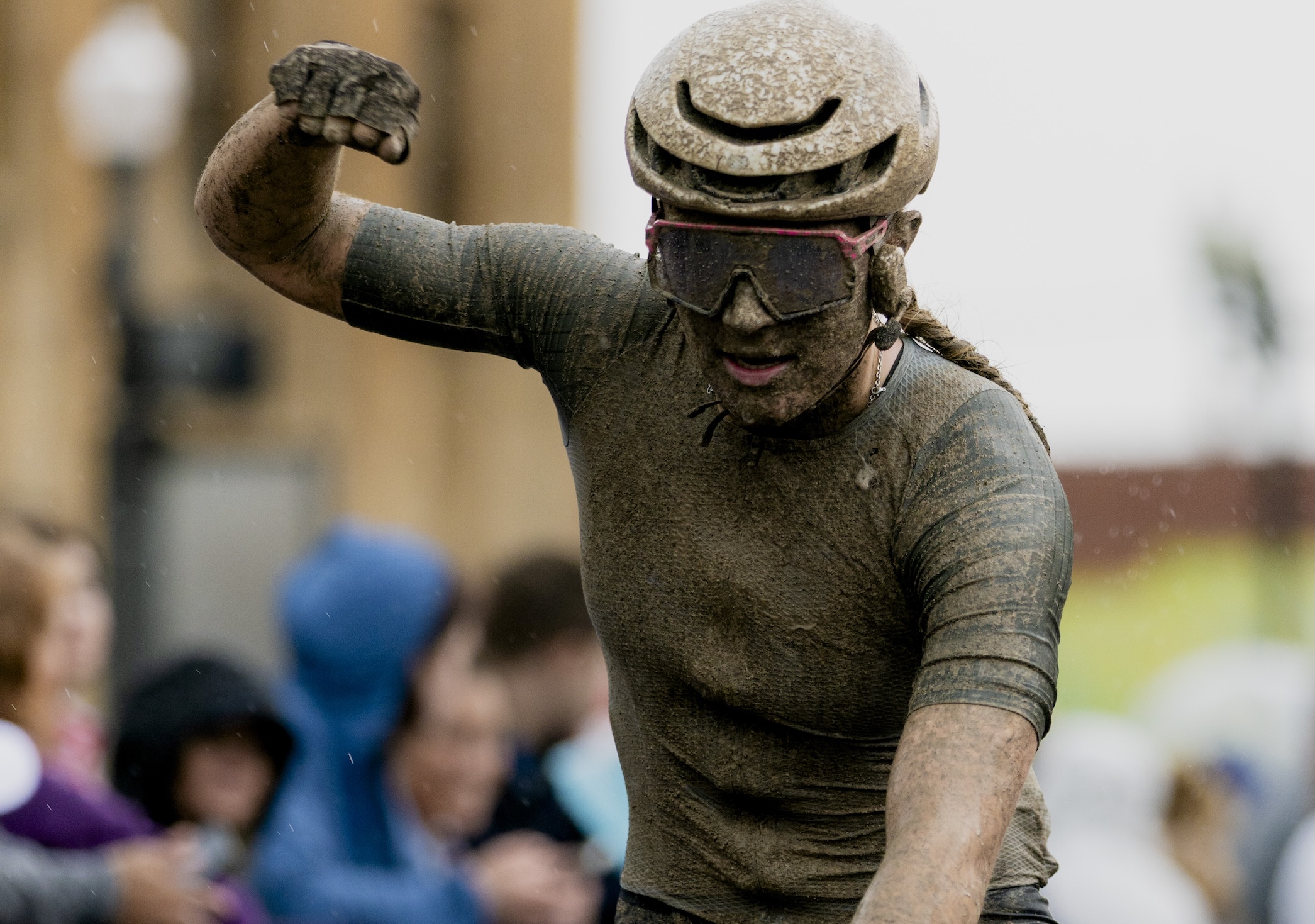 Kylee Hanel celebrates winning Unbound Gravel 100 on a wet and muddy day in Kansas in 2026, taking top points in the women's U23 competition