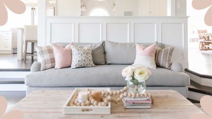 white living room with kitchen beyond to inspire motivation to declutter to keep the space clean and tidy