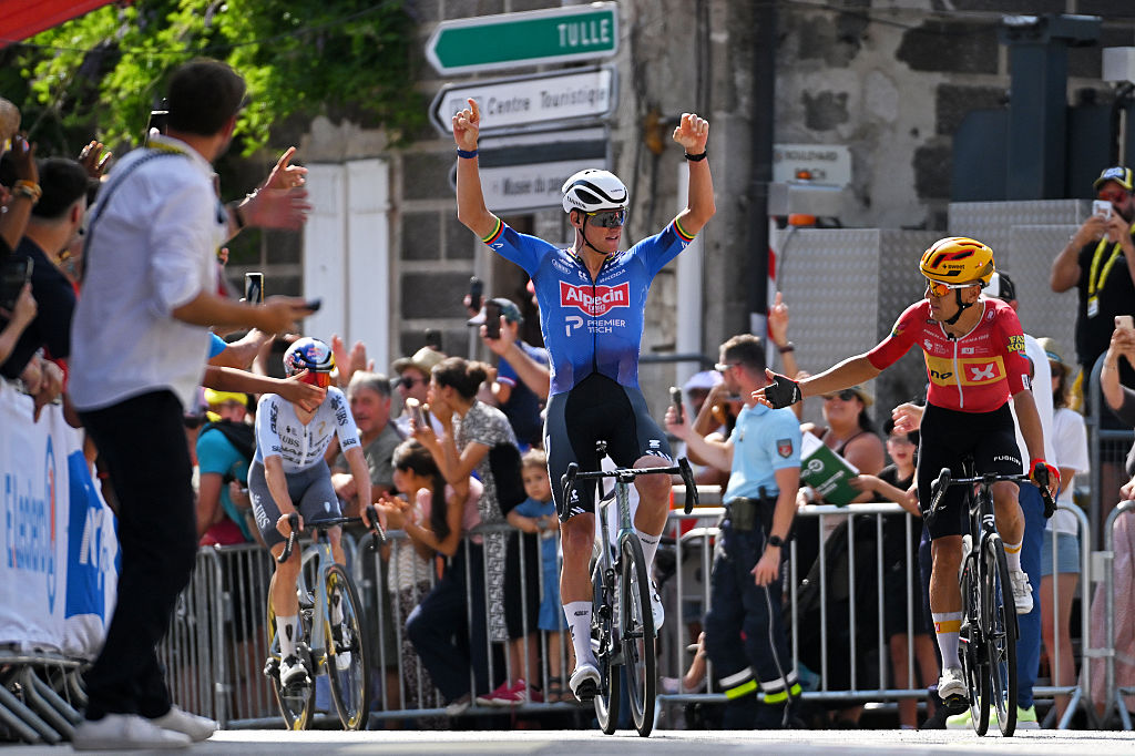 Mathieu van der Poel of Netherlands and Team Alpecin-Premier Tech celebrates at finish line as stage winner ahead of Tobias Halland Johannessen