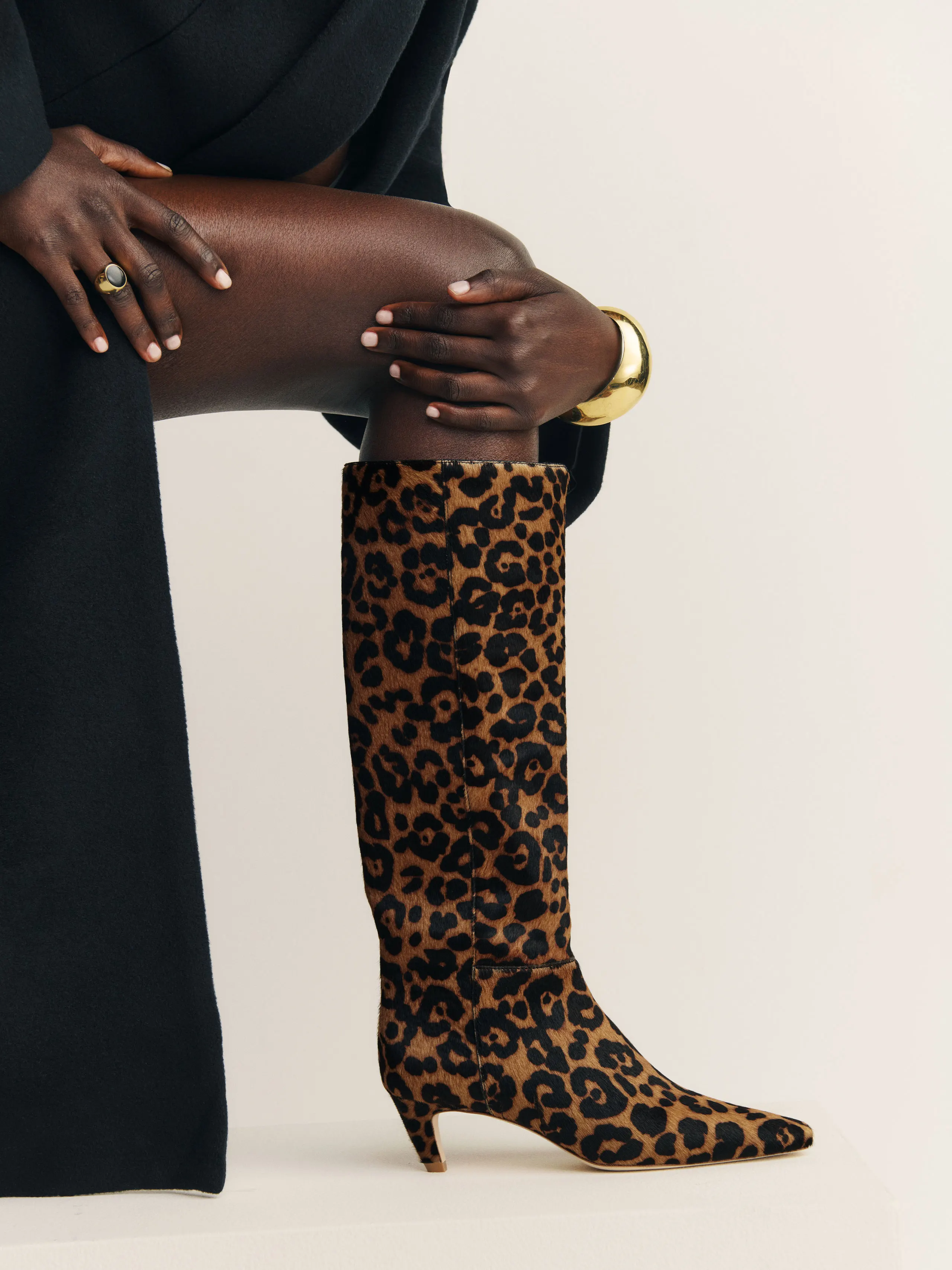 An image of the Remy Knee boots from Reformation.