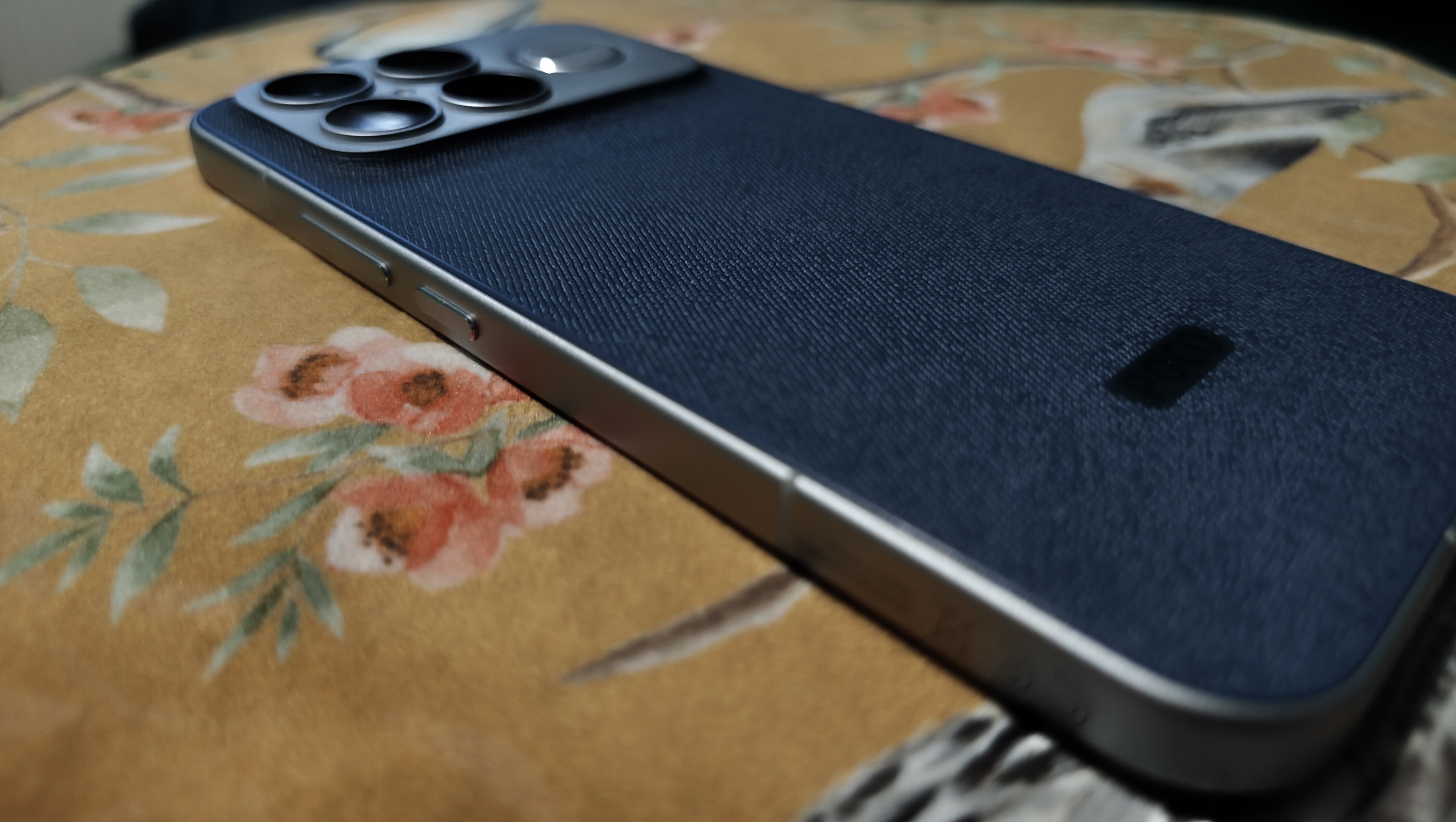 A Poco F8 Ultra on a flower-decorated pillow