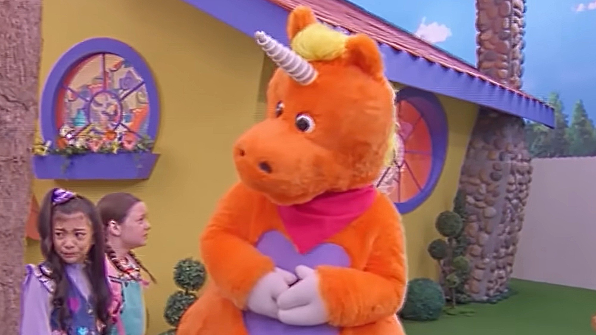 Buddy the Unicorn is shown looking at a crying child in the trailer for Buddy.