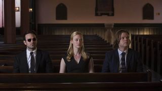 Matt, Karen, and Foggy sit in a church in Netflix's Daredevil TV show
