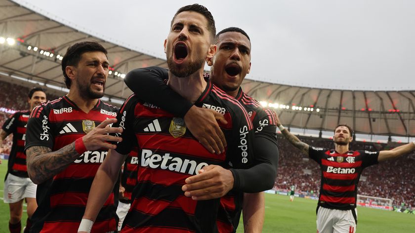 Jorginho celebrates with his Flamengo teammates after scoring against Palmeiras. 