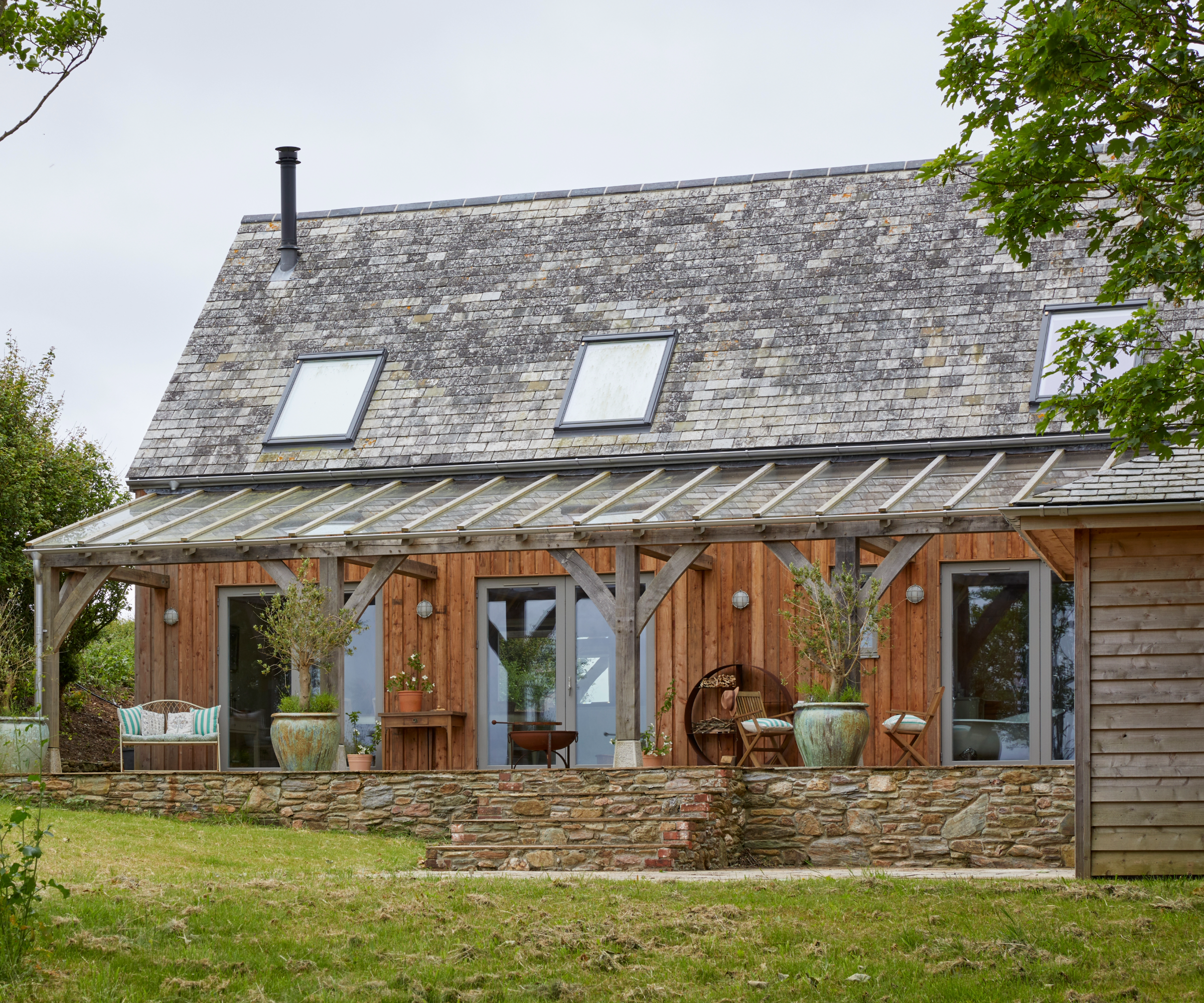 Exterior of the back of the house with patio and garden