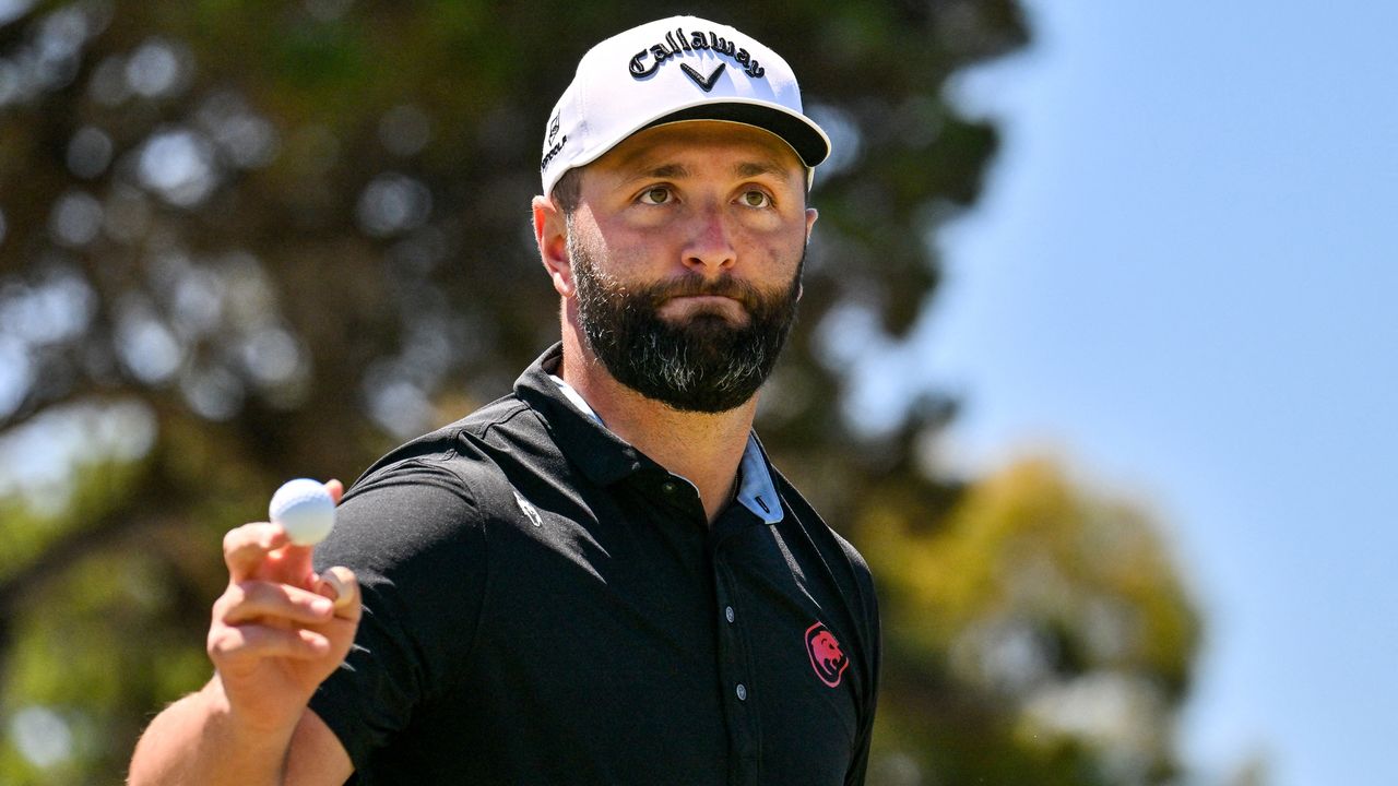 Jon Rahm acknowledges the crowd at LIV Golf Adelaide after holing a putt