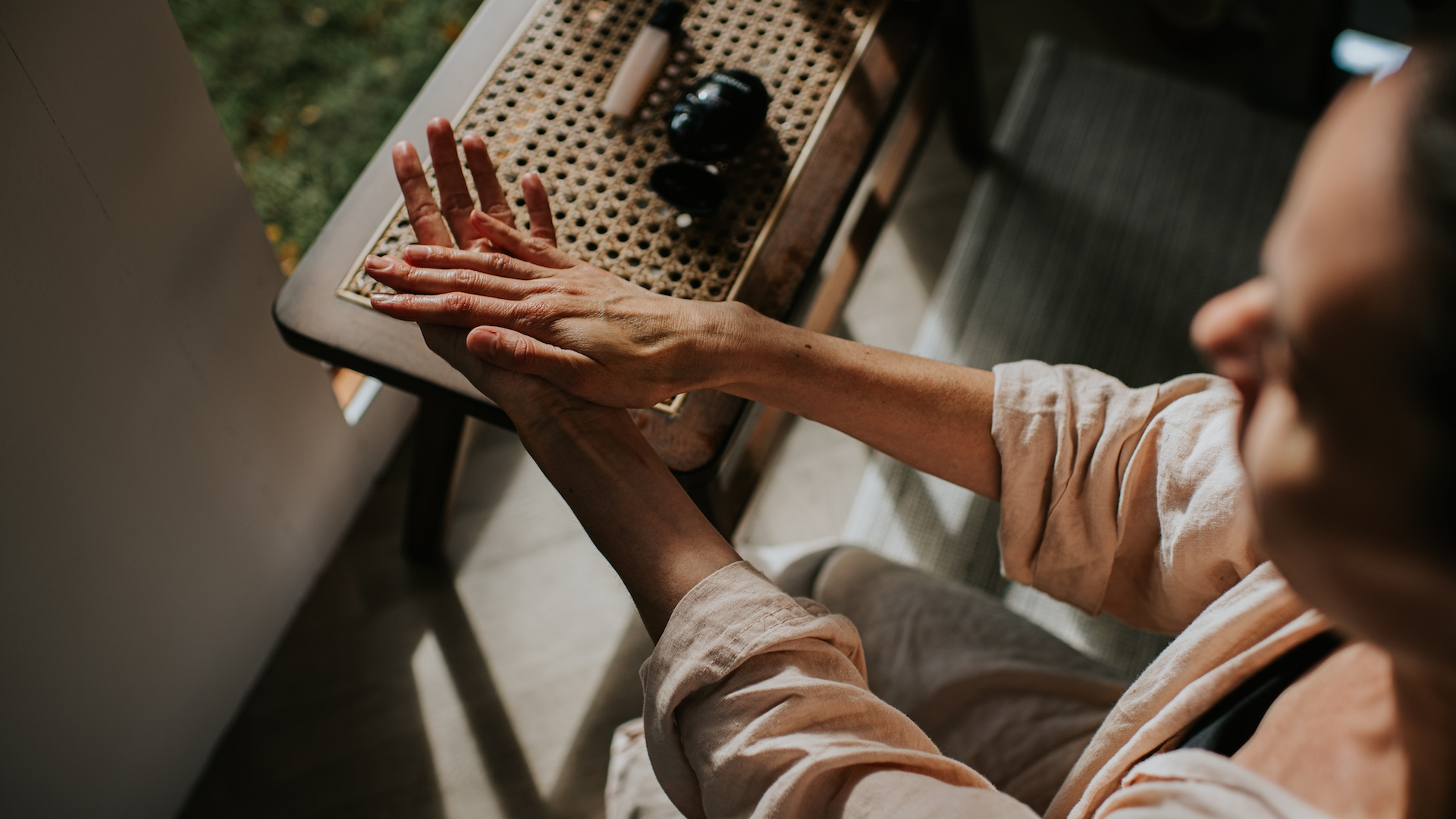 Woman moisturising hands