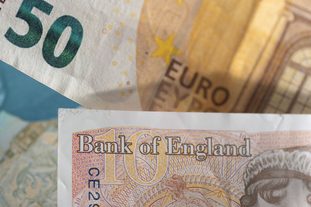 Currency, exchange rate, illustration photo mix of money, Sterling / British Pound GBP and Euro EUR banknotes