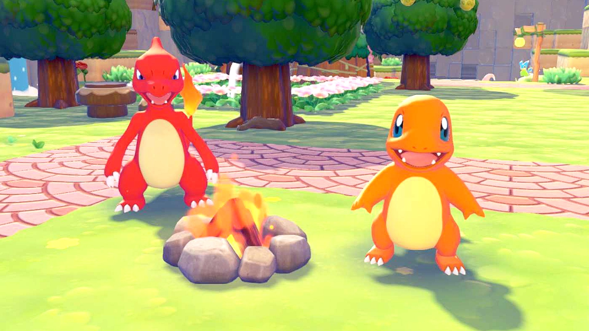 Charmander and Charmleon, Pokemon Pokopia evolutions, pose for a photo.