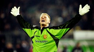 21 Apr 1999: Peter Schmeichel of Manchester United celebrates victory over Juventus in the UEFA Champions League semi-final second leg match at the Stadio delle Alpi in Turin, Italy. United won 3-2 on the night to go through 4-3 on aggregate. \ MandatoryCredit: Ross Kinnaird /Allsport