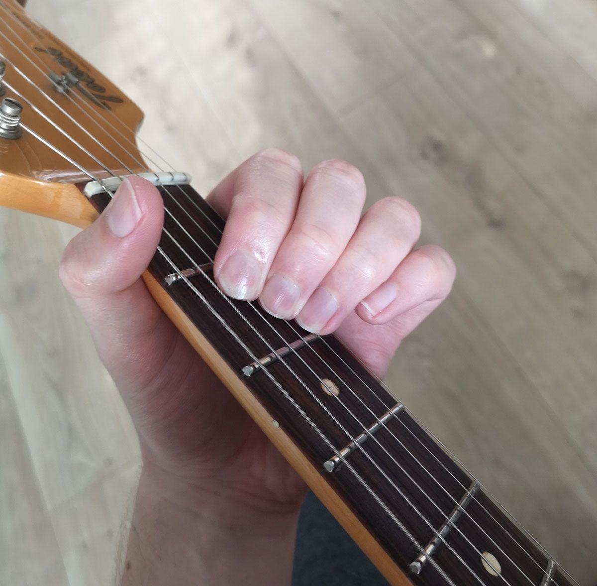 How to play an A chord on guitar: open A